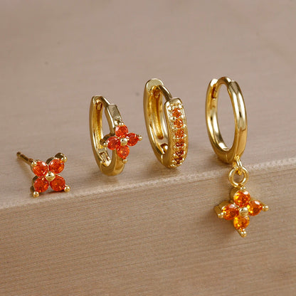 Gold flower ear stack gift set with orange stones