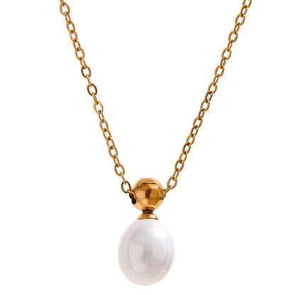 Gold-tone cable chain necklace with a faceted gold bead and an oval pearl drop