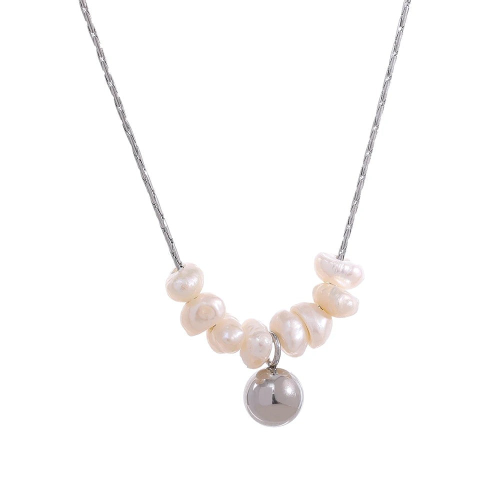 Silver-tone fine chain necklace with a row of small pearls and a silver ball charm